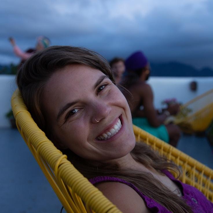 Kaveri Mehta, Lead Design Curator at NeutralGrowthPath, reviewing corporate floral arrangements